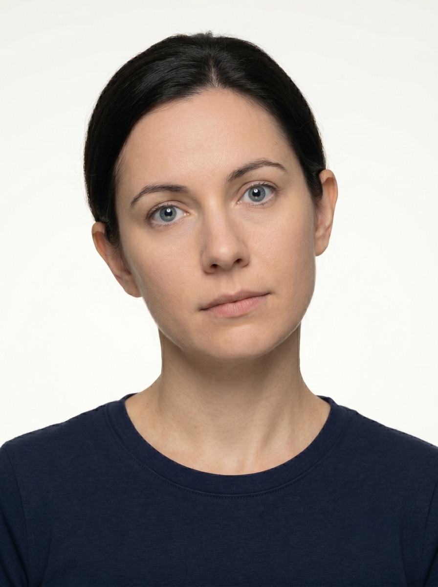 Rejected Brazil visa photo example — head tilted so the eye line is no longer horizontal. Brazil eVisa / VFS Global would reject this for visa applications.